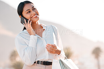 Buy stock photo Shopping bag, phone call and woman talking to customer service for client communication, fashion or online review on 5g network. Wealth, luxury and retail girl in city on smartphone for ecommerce faq