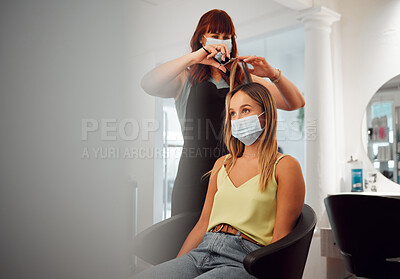 Buy stock photo Covid, mask and hairdresser women in salon with protection for professional hair grooming business. Los Angeles hairstylist busy cutting with medical face barrier for virus transmission safety.

