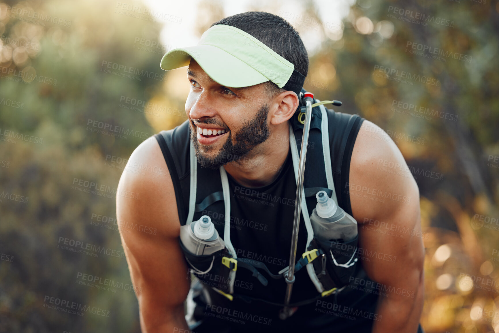 Buy stock photo Tired, happy and man thinking after fitness training for cardio, wellness and body goal in nature. Runner athlete breathing after running, doing sport exercise and workout for health in a park