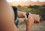 Fitness man, arm and watch time for running exercise, workout challenge and healthy training outdoors. Cardio, sports runner and athlete break to monitor steps count, heart rate and wellness progress