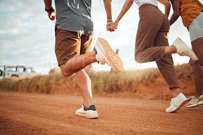 Buy stock photo Running, feet and friends holding hands on holiday in the countryside of Italy together. Legs of group of people playing on a run with support, freedom and adventure on a road trip in nature
