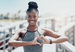 Black woman, fitness and portrait heart gesture for healthy exercise, training and workout in the outdoors. Happy active African American female runner with smile and love shape hands for wellness