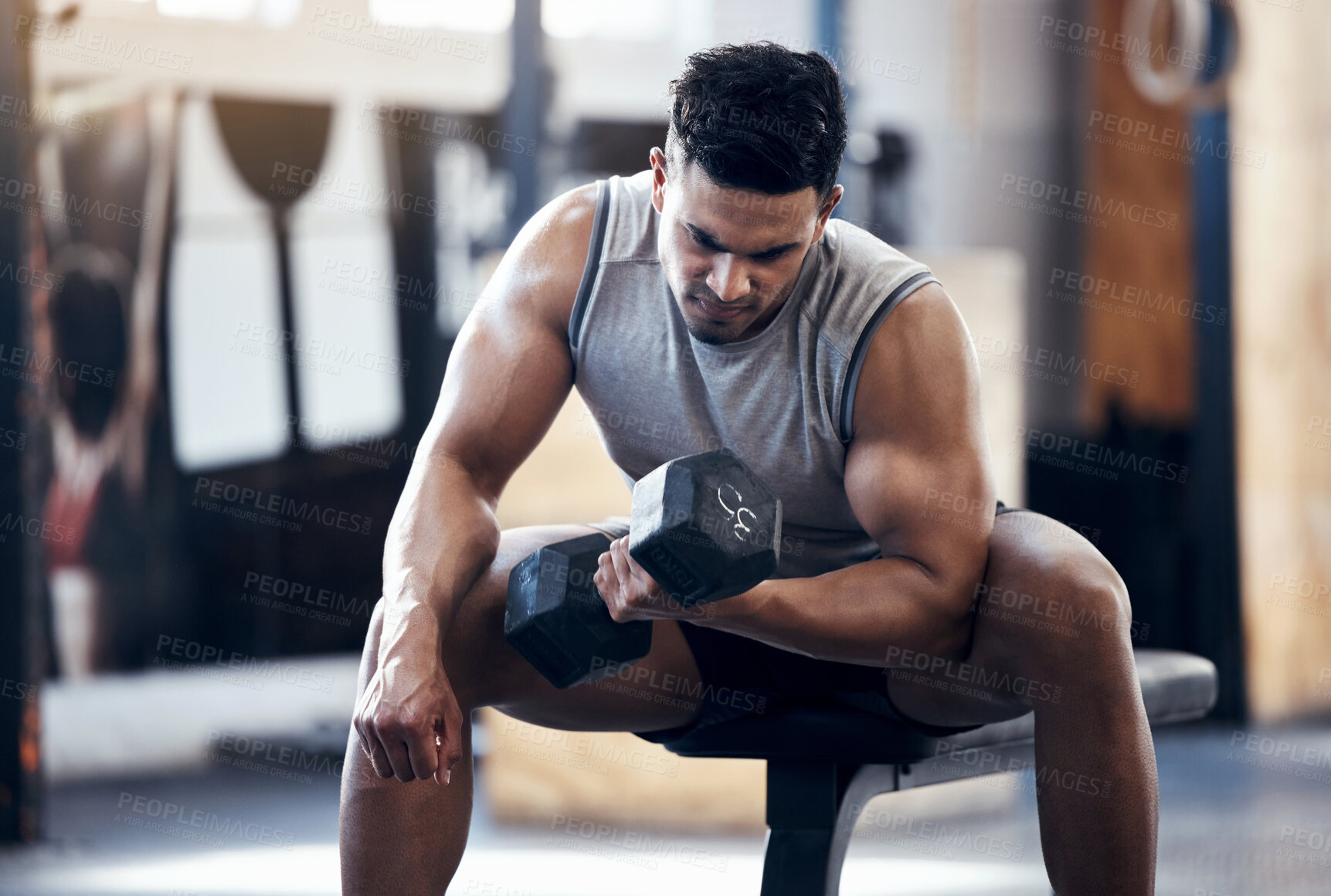 Buy stock photo Fitness, gym and dumbbell of muscular man lifting weights for warm up exercise and workout. Strong male athlete in sports training and weightlifting for body building strength and health indoors