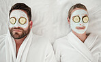 Love, relax and couple at spa with face mask for luxury wellness treatment together from above. Professional skincare facial for self care detox and relaxation on cosmetic salon bed in Canada.


