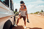 Couple piggy back on road trip in Australia, travel adventure in summer holiday and outdoor truck drive. Young happy people walking on street, vacation lifestyle together and transport in sunset 