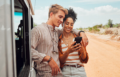 Buy stock photo Car, phone and couple on a road trip in summer on holiday to enjoy traveling and sharing social media news. Nature, interracial and happy woman searching on gps map with calm partner on a vacation