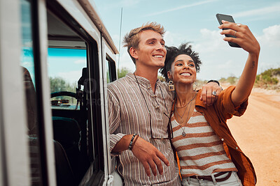 Buy stock photo Couple, phone selfie and safari travel on game drive in nature environment, sand desert or dry Kenya landscape. Smile, happy and bonding interracial man and woman with 5g mobile technology photograph