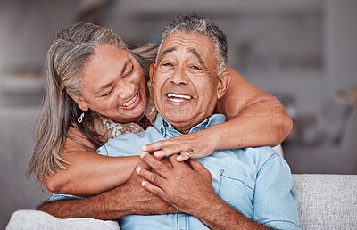 Buy stock photo Happy senior couple, hug and care in love for relationship bonding together relaxing at home. Joyful elderly man and woman smile in hope for loving and hugging happiness in retirement house on sofa