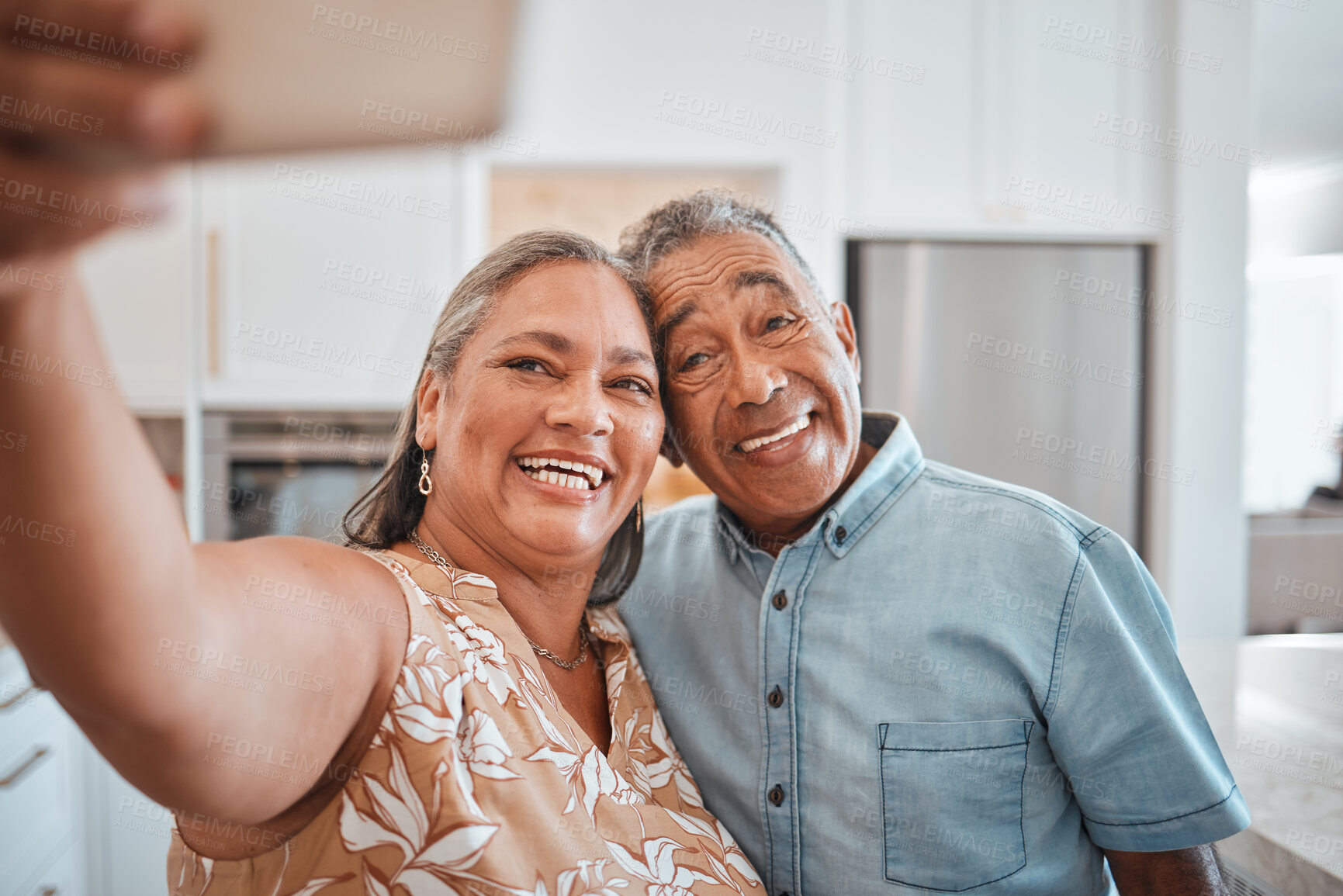 Buy stock photo Selfie, senior couple and happy in kitchen at home being romantic, fun and smile together for anniversary. Retirement, elderly man and woman being loving, bonding or relax indoors for love or romance