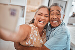 Smartphone, selfie and senior couple hug together in home retirement celebration, social media update or online digital gallery memory. Happy, love and quality time elderly people in portrait picture