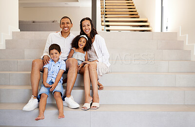 Buy stock photo Family, stairs and smile in new home, property or mansion together for mockup portrait. Parents, children and happy in luxury house, real estate or apartment with happiness on face while on staircase