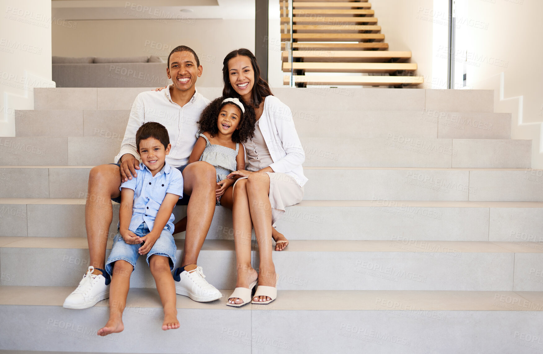Buy stock photo Family, stairs and smile in new home, property or mansion together for mockup portrait. Parents, children and happy in luxury house, real estate or apartment with happiness on face while on staircase