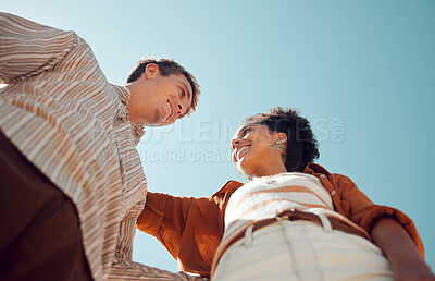 Buy stock photo Happy, outdoor and view from the bottom of a couple standing with blue sky while on holiday. Happiness, love and young man and woman on journey, travel or adventure together while on summer vacation.
