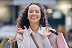 Shopping, black woman and smile after a shop, fashion retail or luxury store trip with happiness. Portrait of a happy rich young female from Paris in the city sitting in a urban city smiling with joy