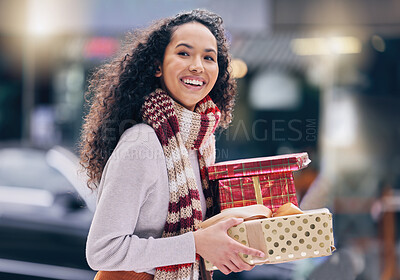 Buy stock photo Christmas gift shopping, customer and city girl buy sales, discount or retail product for festive season. Happiness, presents and smile from happy black woman on shopping spree travel in urban town