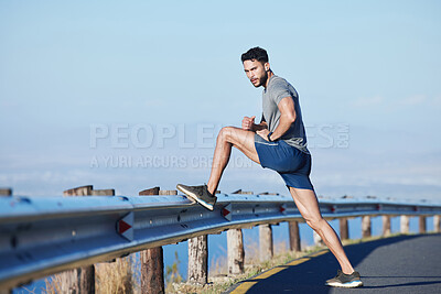 Buy stock photo Health, man athlete and stretching outdoor for wellness, fitness and dedicated workout. Healthy male, relax trainer in sportswear or being focus, doing warm up or strong cardio for training exercise.