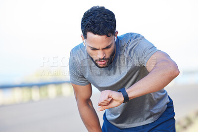 Buy stock photo Tired runner, fitness training and man health check on smart watch. Sports athlete training, healthy lifestyle exercise motivation and tracking heartbeat, pulse and measuring speed outdoors