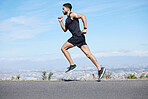 Man running in road, fitness training and run for cardio, health and wellness for healthy lifestyle. Young runner, endurance and sport motivation, fast and fit athlete and exercise journey. 