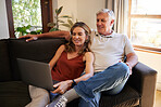 Movie, laptop and senior couple streaming a show on the internet on the living room sofa of their house. Happy, relax and elderly man and woman reading the news on the web with technology on couch