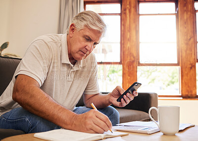 Buy stock photo Smartphone, budget planning and senior man in living room for retirement research, website investment information or asset management. Elderly person writing notes, using phone online finance banking