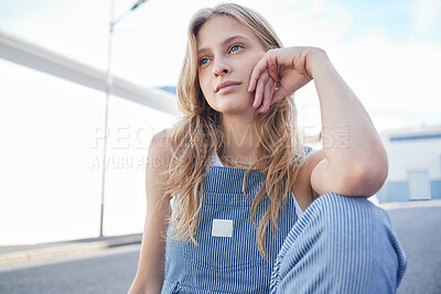 Buy stock photo Woman, street and thinking of goal, dream or future with focus, idea and wonder on face in city. Student, creative or fashion for girl sitting in road for thought, sad and depression in her life