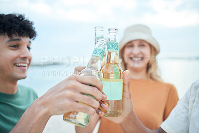 Buy stock photo Beer, toast and friends in celebration at the beach for holiday, summer and freedom to travel together. Group of people cheers with alcohol to celebrate a party, vacation and relax by the sea