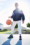 Basketball, game and black man with fashion on court while training for fitness and exercise during summer. Portrait of an African athlete with ball for sports event, competition or match in the USA