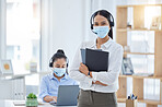 Covid, receptionist in a mask at office and professional business secretary working through pandemic. Corporate woman employees, during coronavirus epidemic and focus on health or safety at workplace