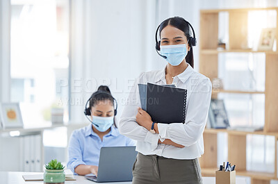Buy stock photo Covid, receptionist in a mask at office and professional business secretary working through pandemic. Corporate woman employees, during coronavirus epidemic and focus on health or safety at workplace