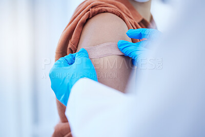 Buy stock photo Doctor hand, covid vaccine and plaster on patient for virus protection or illness prevention. Medical professional, health care worker and place bandage on arm wound after vaccination injection