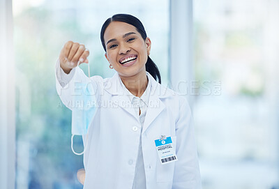 Buy stock photo Doctor, covid end and smile of a woman healthcare employee in a hospital or clinic holding a mask. Portrait of a medical professional and consultant from Guatemala happy to after corona safety