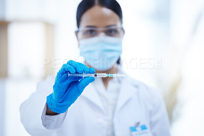 Buy stock photo Doctor, covid 19 and vaccine in hospital, lab or clinic for safety, health and wellness against virus. Woman, healthcare and ppe at work in medical facility with vaccination for coronavirus in Canada