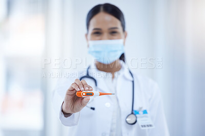 Buy stock photo Thermometer, covid and doctor with digital results of fever while working in a hospital. Portrait of a nurse, medical worker and surgeon with reading from tech for safety from virus with a face mask