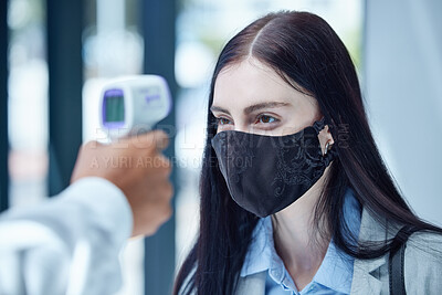 Buy stock photo Doctor, covid and thermometer for healthcare scan to test patient temperature or check for fever or symptoms. Businesswoman with corona mask in exam, scanning face with infrared scanner at the office