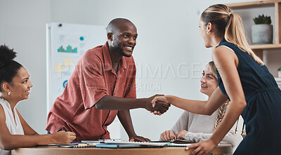 Buy stock photo Partnership, handshake and people in business meeting in multicultural office. Diversity, teamwork and happy team shaking hands with new worker. Businessman and businesswoman partners making a deal