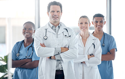 Buy stock photo Medical, doctor and happy nurse staff confident, with cross arms and healthcare stand together with smile and success. Portrait of lead surgeon, dedicated team and health clinic proud diversity group