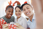 Christmas, selfie and business people with gift for giving, love and celebration with holiday office party or workplace culture and diversity. Corporate staff in portrait pov picture with present box
