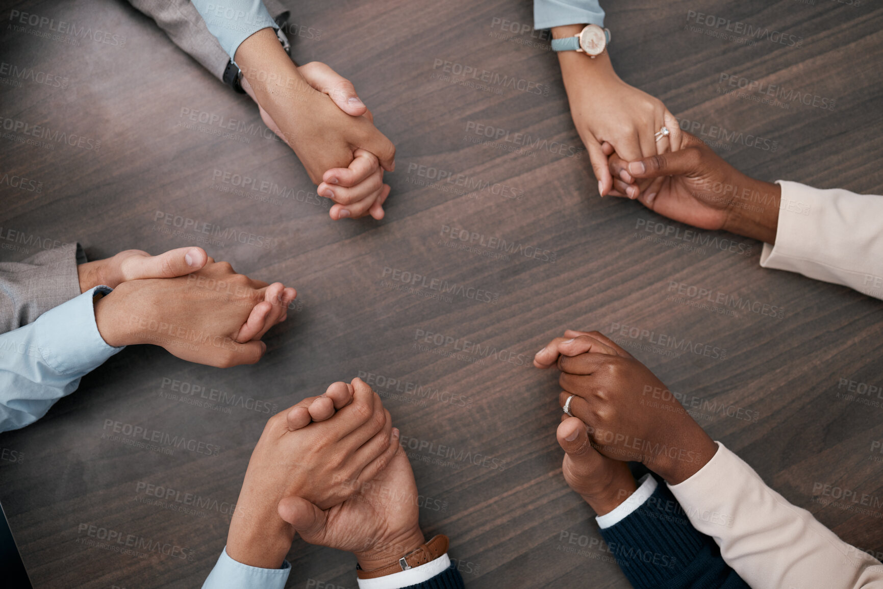 Buy stock photo Teamwork, collaboration and business people holding hands before meeting in the office. Diversity, team and support in corporate business with men and women employees connected together in circle