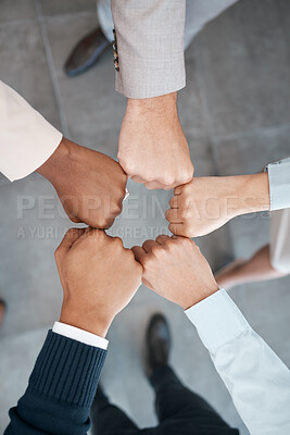 Buy stock photo Fist, meeting and employees in a circle for support, team building and partnership in an office at work. Top view of hands of corporate workers for motivation, success and solidarity working together