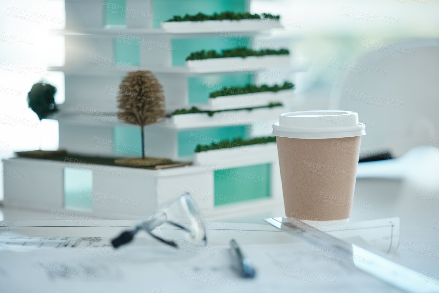 Buy stock photo Model, coffee and architecture with goggles, a blueprint and a pen on the desk of an architect. Construction, engineering and design in an empty office for creative, planning or the building industry