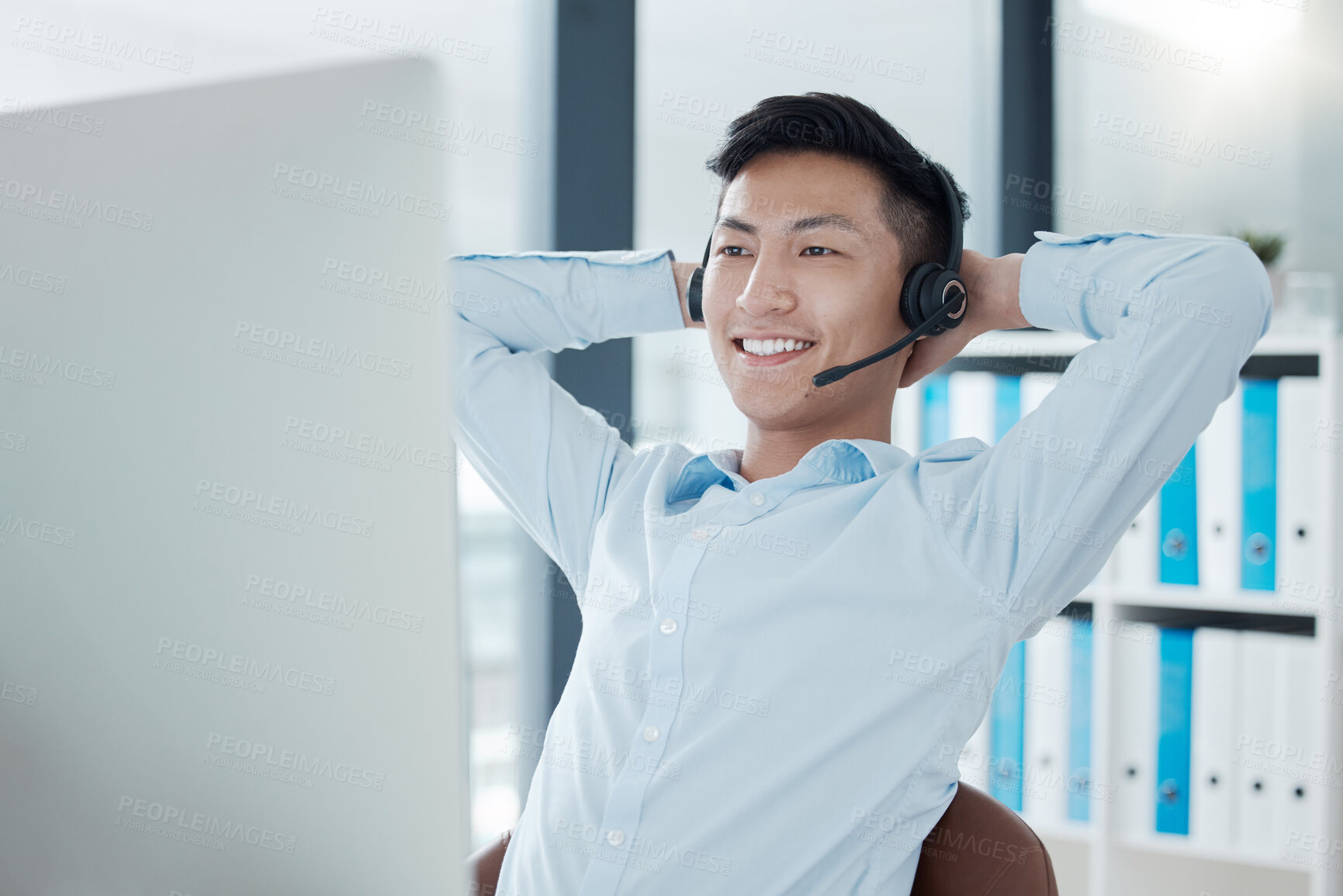Buy stock photo Asian man in call center office stretching, relax in easy working for customer support service company in Seoul.
Telemarketing agent in corporate consulting, receptionist call and employee wellness