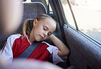 Soccer, travel and girl sleeping in a car tired from sports practice, training and fitness workout for children. Transportation, relaxing and young kid resting and dreaming peacefully after football