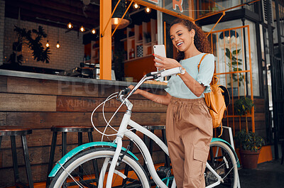 Buy stock photo Woman, happy and bike with phone at cafe on travel in city with bag. Black woman, smartphone and smile for communication, meme or social media on app with bicycle at coffee shop in San Francisco