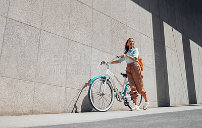 Buy stock photo Bike, urban and black woman cycling in the city of Norway for a sustainable lifestyle. Happy, young and smile African girl with a bicycle being eco friendly for her carbon footprint and clean energy
