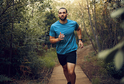 Buy stock photo Forest, fitness and runner man training for marathon on trail path in Mexico with concentration. Cardio, workout and goals of guy practicing running speed for athlete competition with focus.