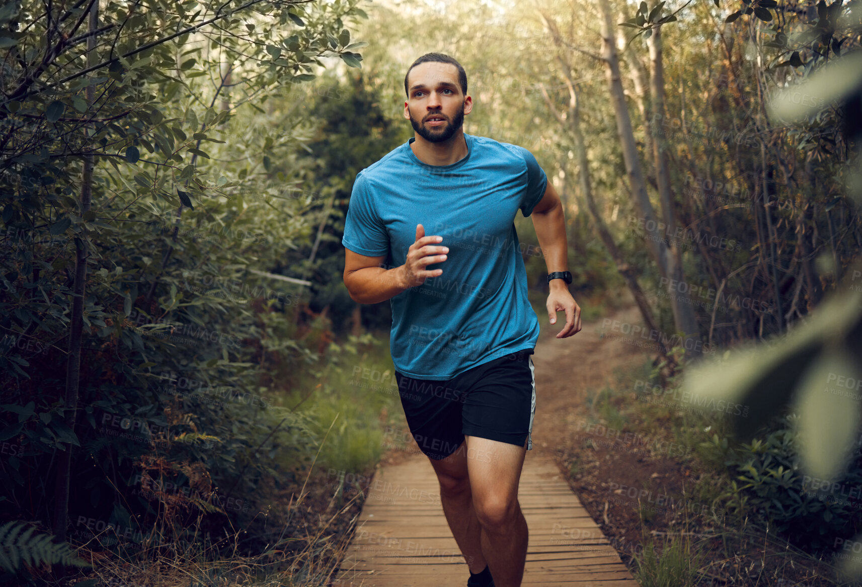 Buy stock photo Forest, fitness and runner man training for marathon on trail path in Mexico with concentration. Cardio, workout and goals of guy practicing running speed for athlete competition with focus.