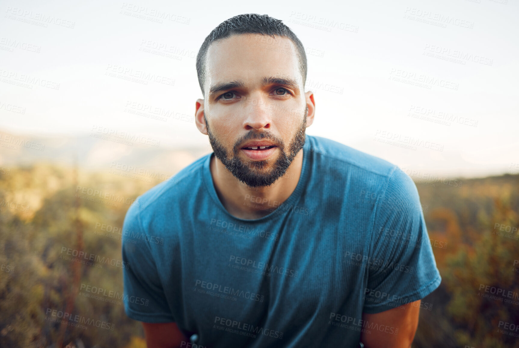 Buy stock photo Fitness, running and man portrait with sweat face in forest for cardio exercise in Phoenix, USA. Runner workout with wet and tired guy taking a breath to rest and cool down in green woods.