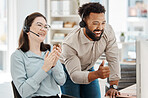 Crm, call center and thumb up with team celebration and smile at work in office learning from manager. Man, woman and diversity in training for customer service, help and support in telemarketing