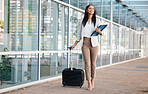 Airport, corporate professional manager and company flight travel for seminar or convention. Happy woman walking with suitcase bag, carry business files and smiling outdoors on way to plane