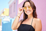 Fashion, beauty and glasses with a woman in the city during a sunny summer day with a smile. 